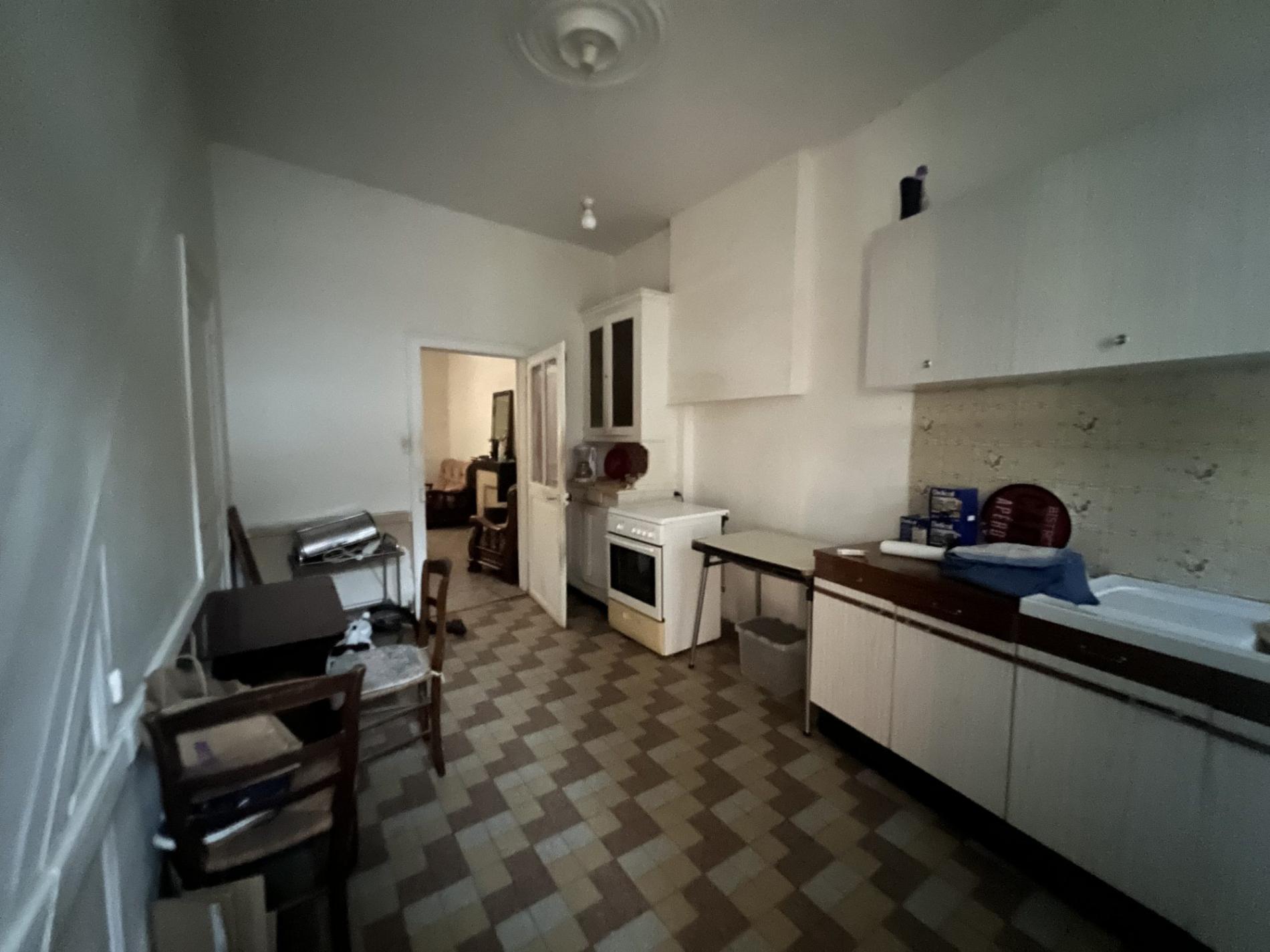 Maison de ville à rénover avec jardin !