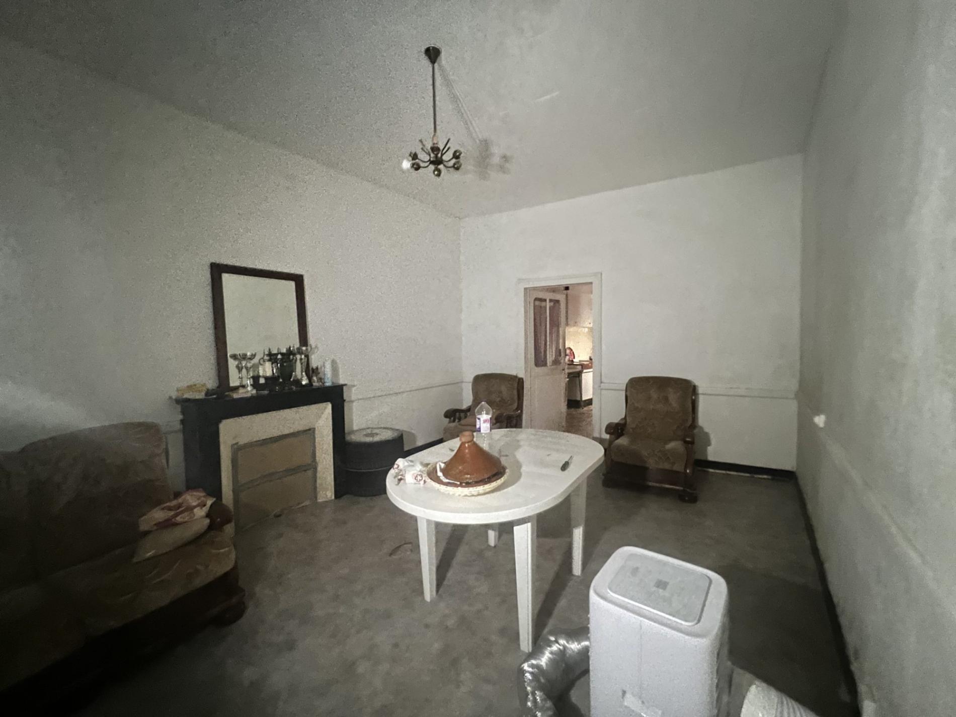 Maison de ville à rénover avec jardin !