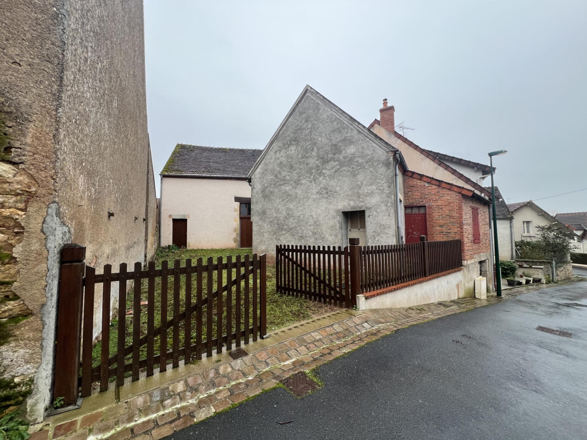 Maison de ville avec dépendance et jardin !