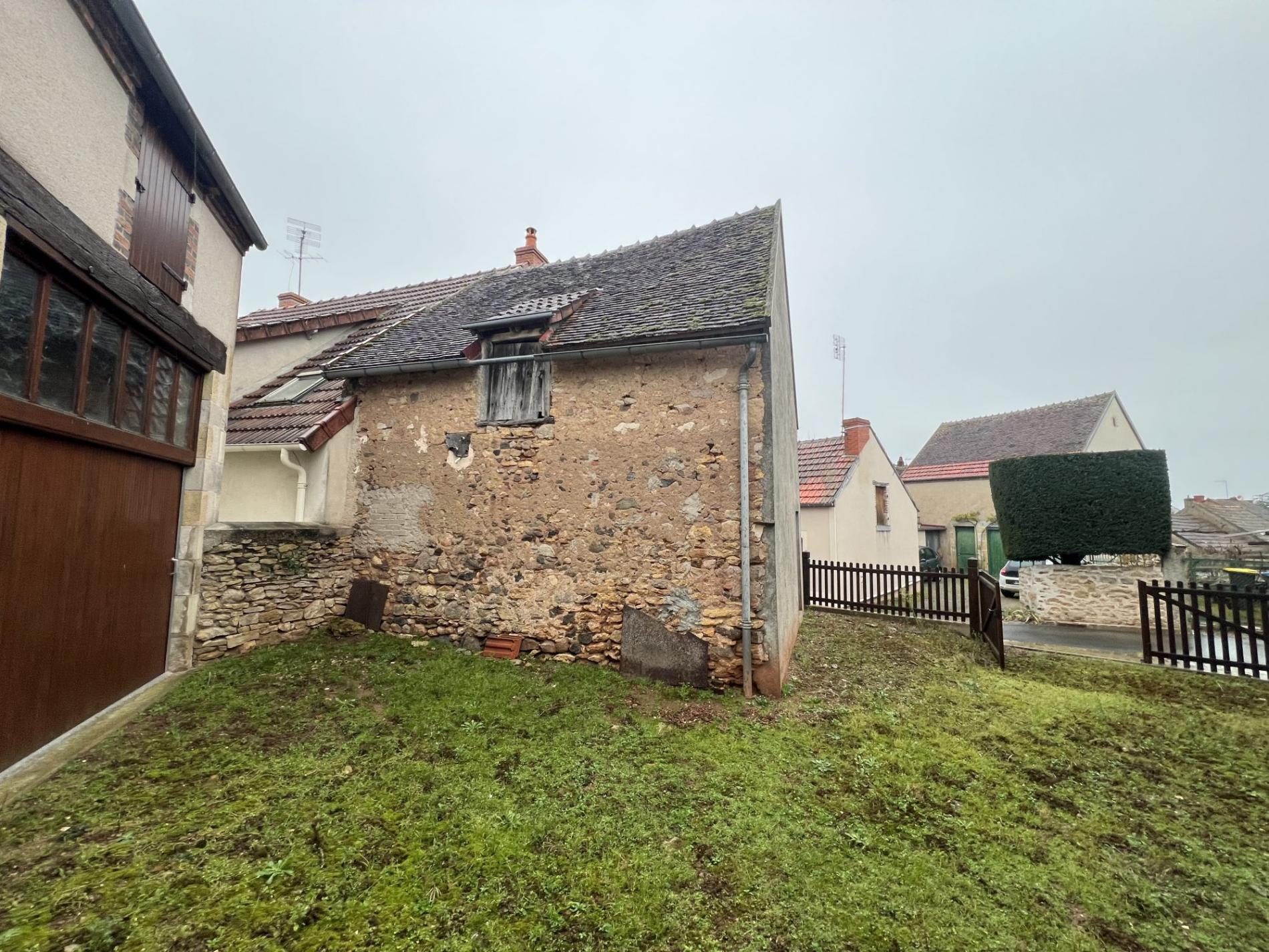 Maison de ville avec dépendance et jardin !