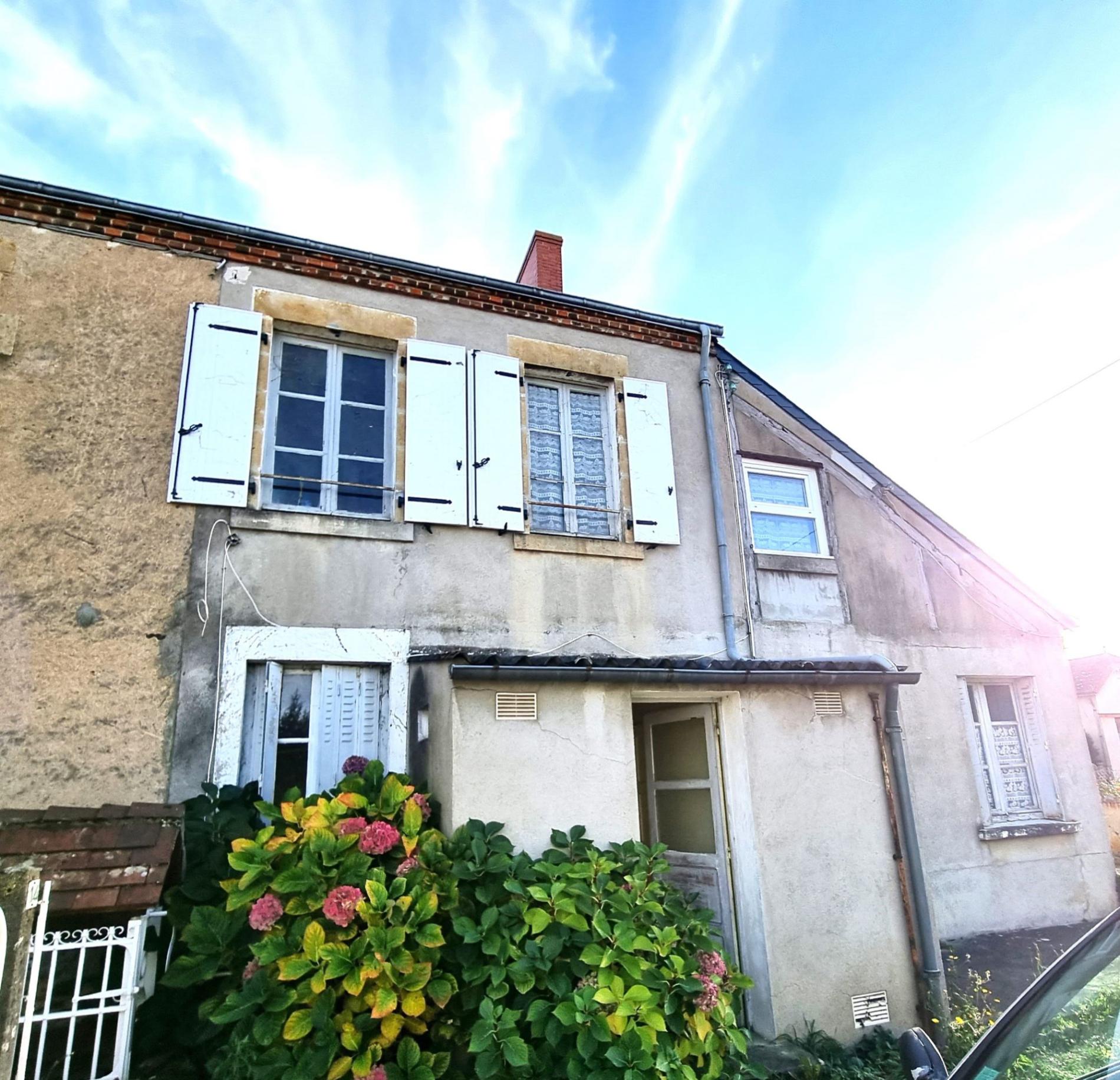 Maison de ville avec local commercial !