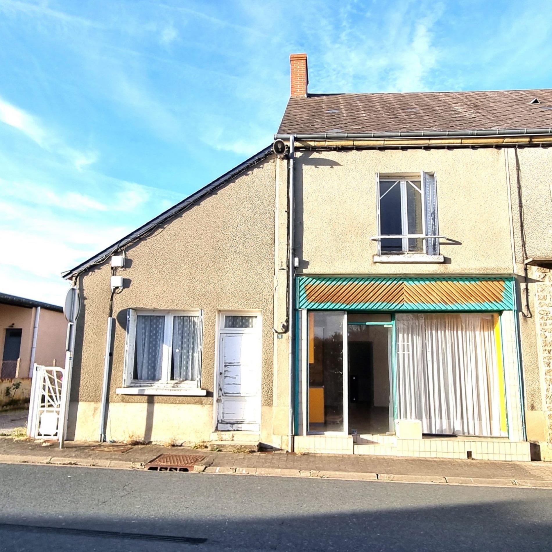 Maison de ville avec local commercial !
