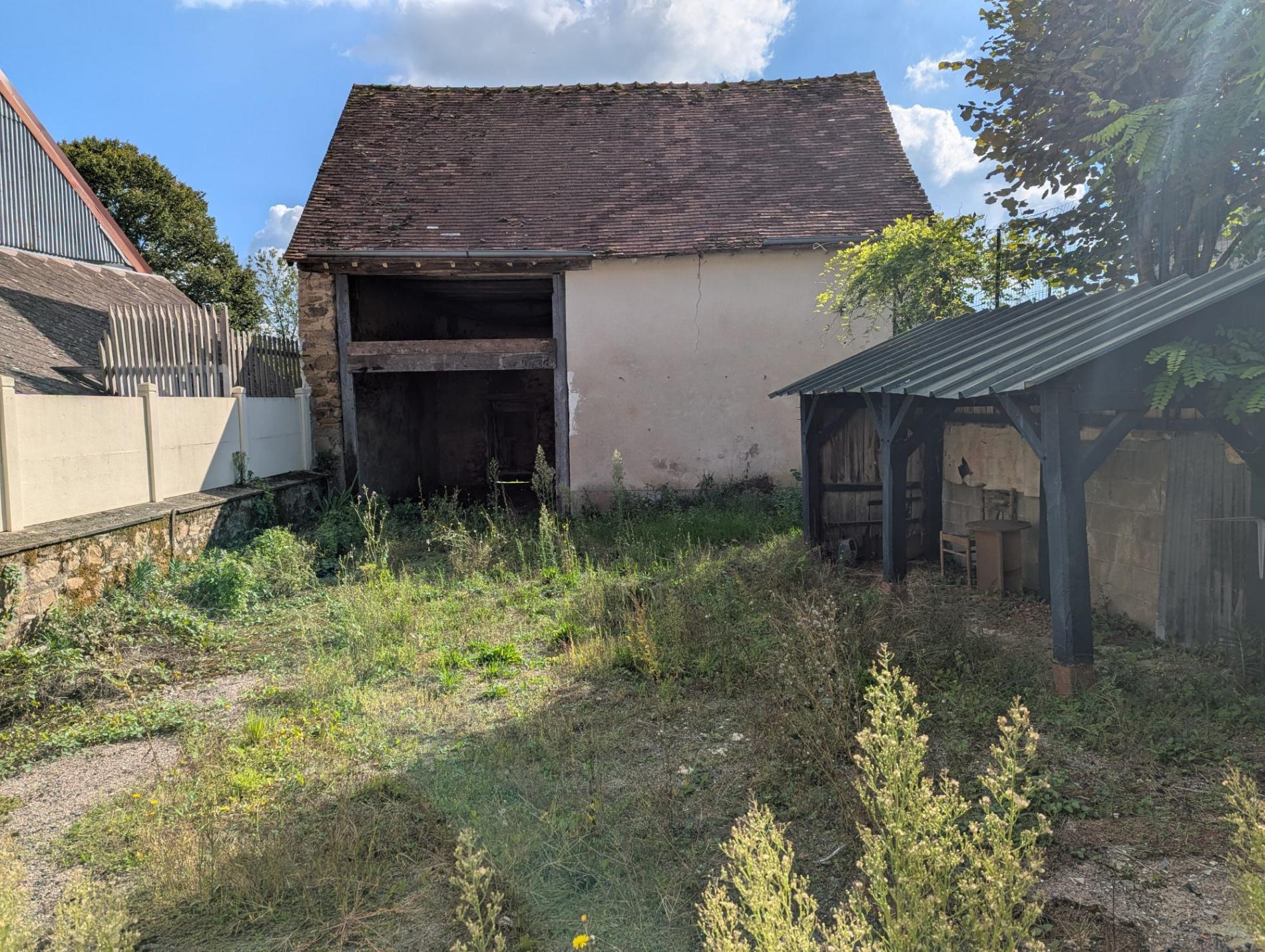 Maison de bourg avec dépendance et jardin !