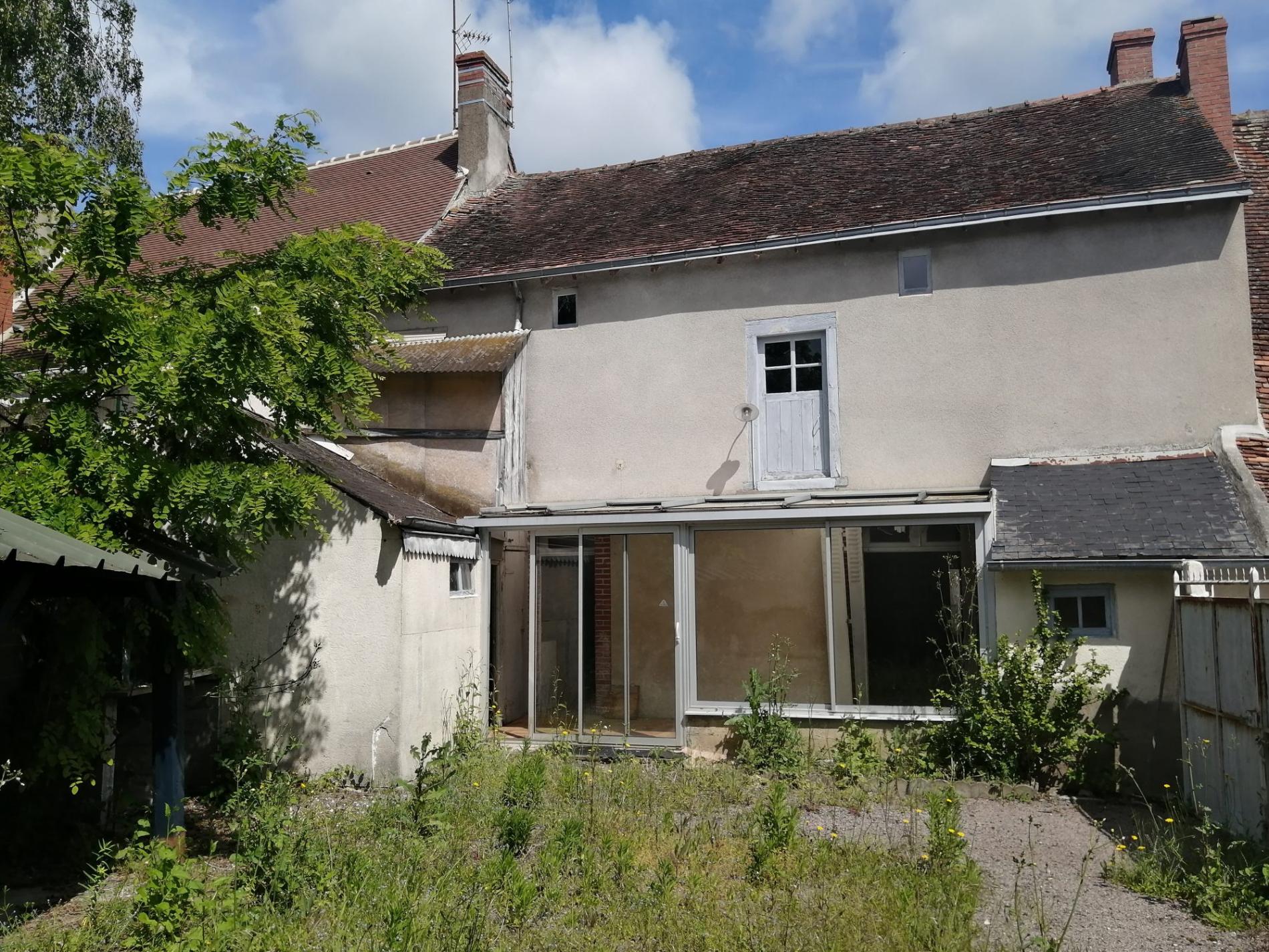 Maison de bourg avec dépendance et jardin !