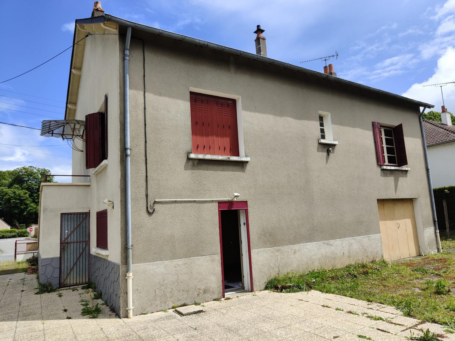 Maison de bourg avec atelier !