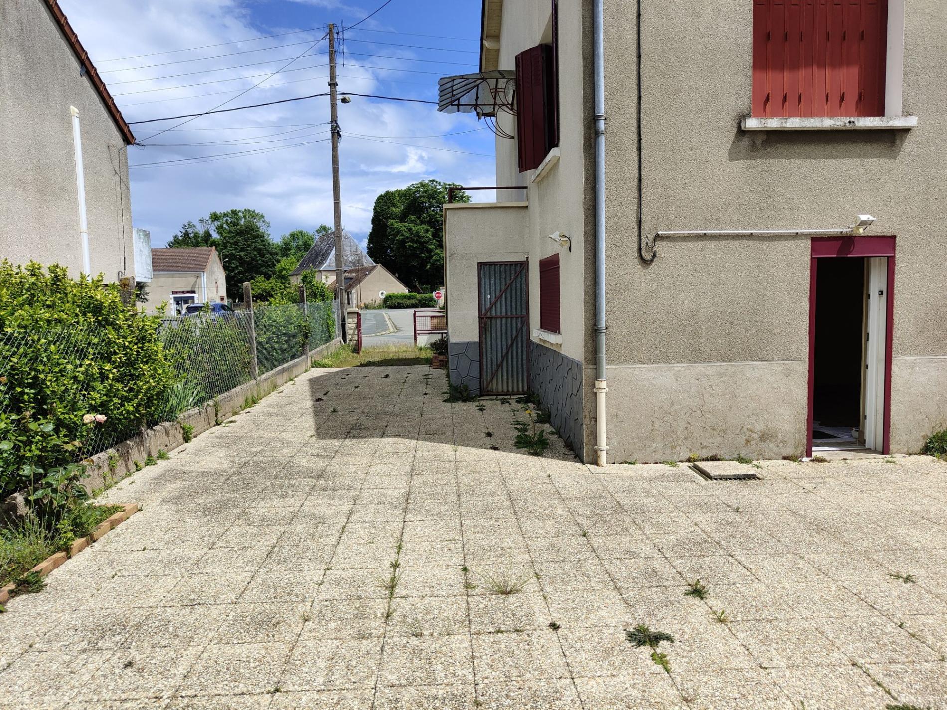 Maison de bourg avec atelier !