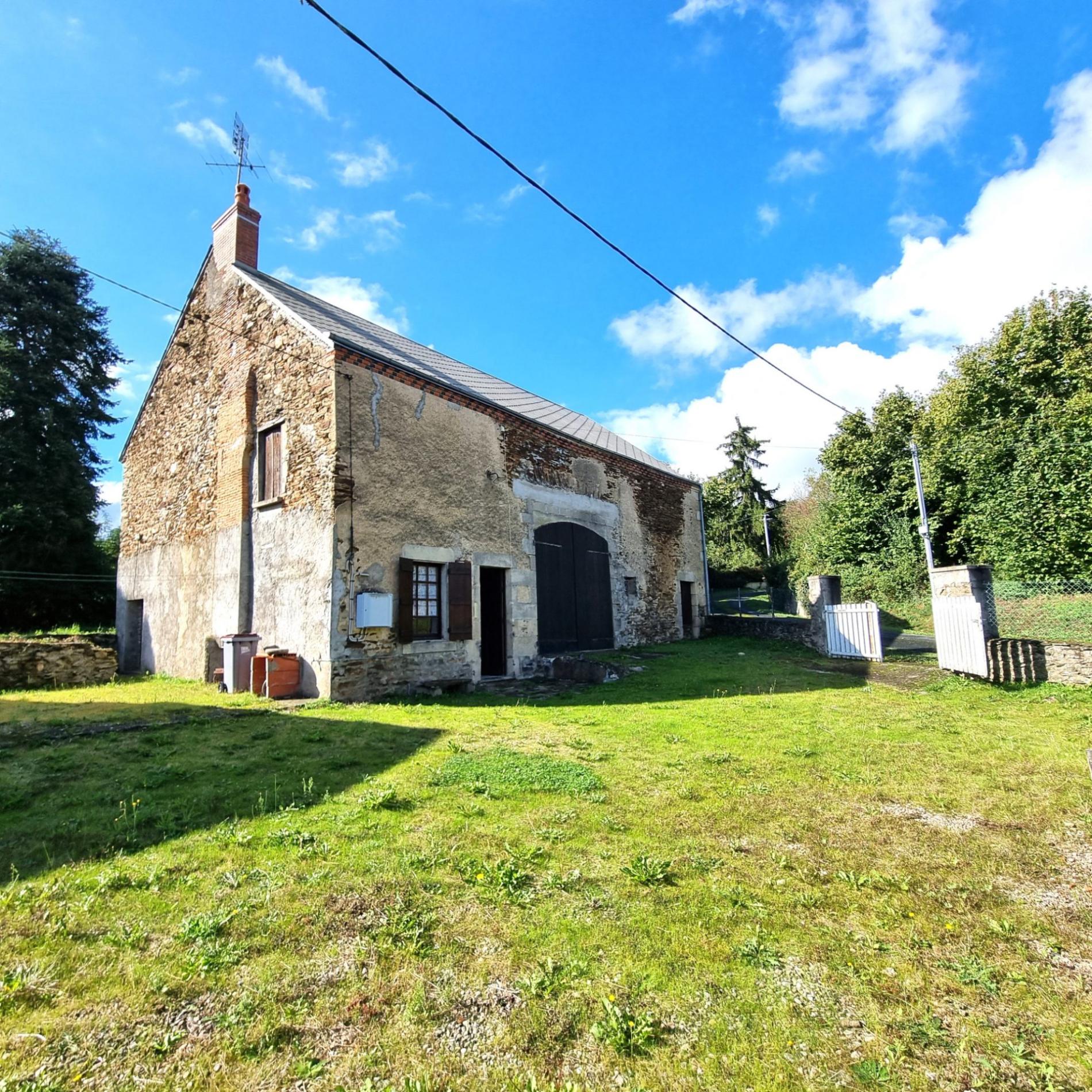 Grange avec partie aménagée !