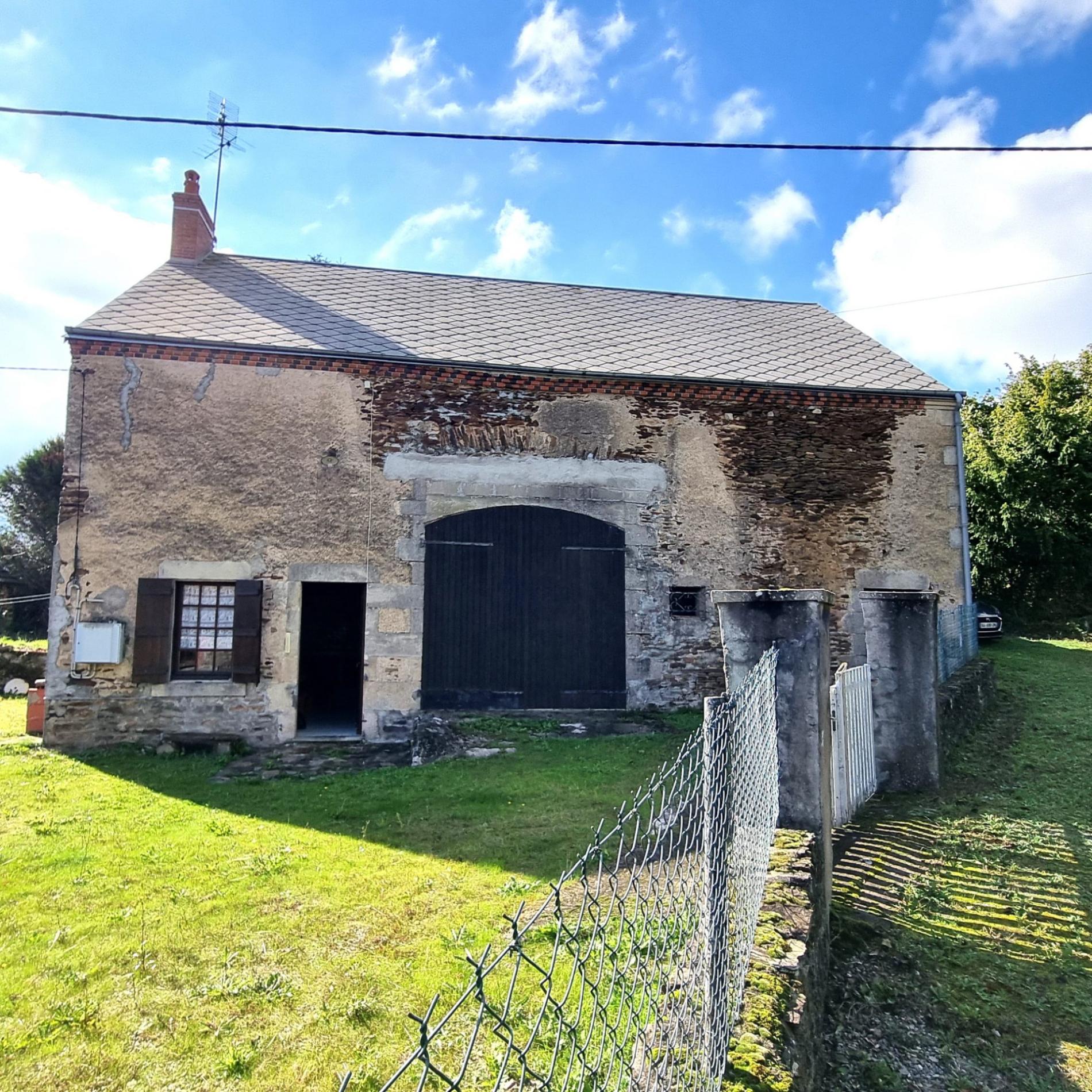 Grange avec partie aménagée !