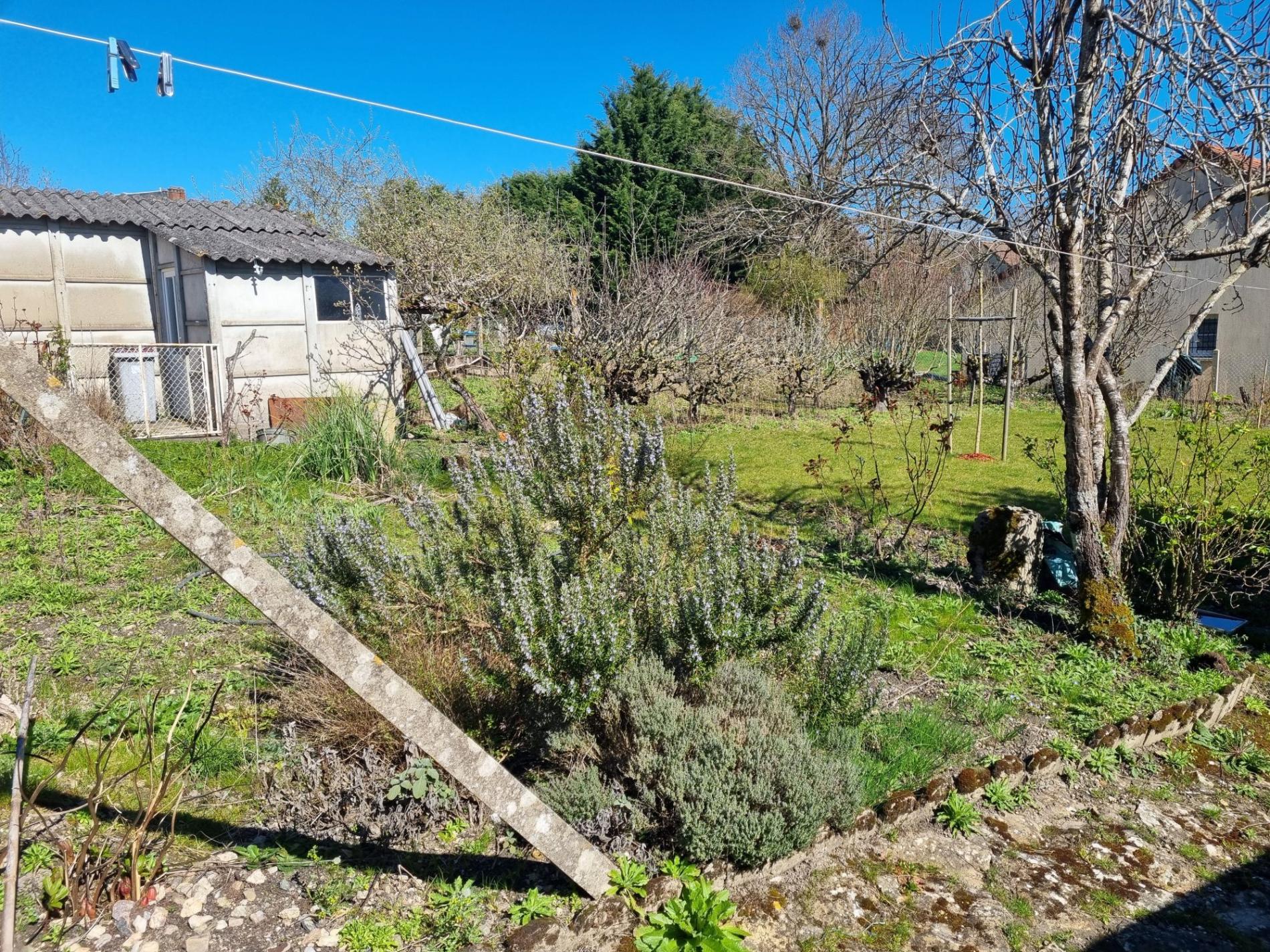 Maison de plain pied avec jardin et garage !
