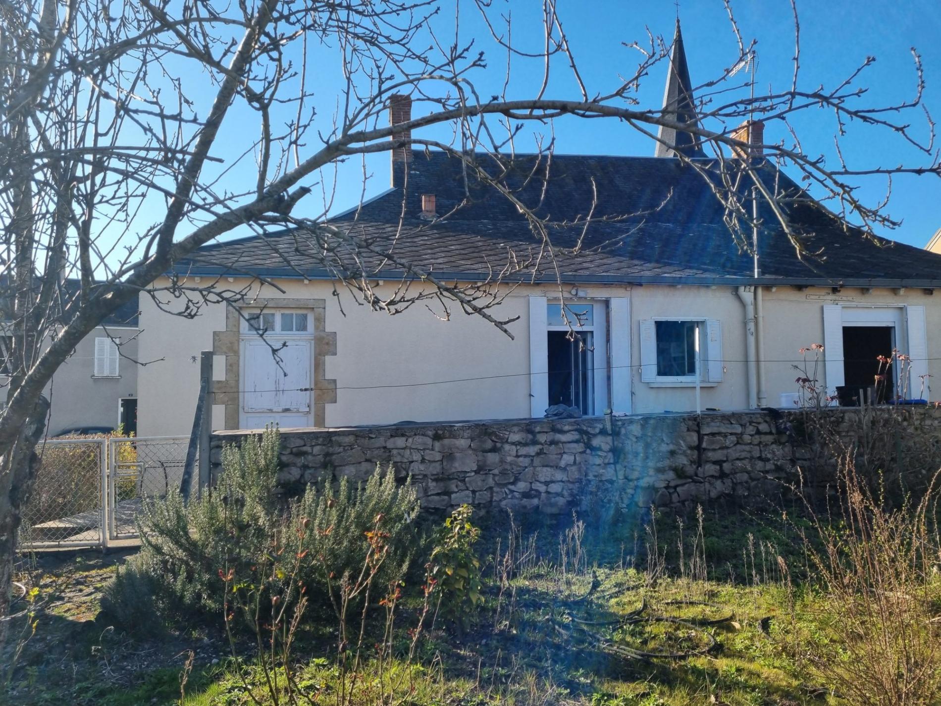Maison de plain pied avec jardin et garage !