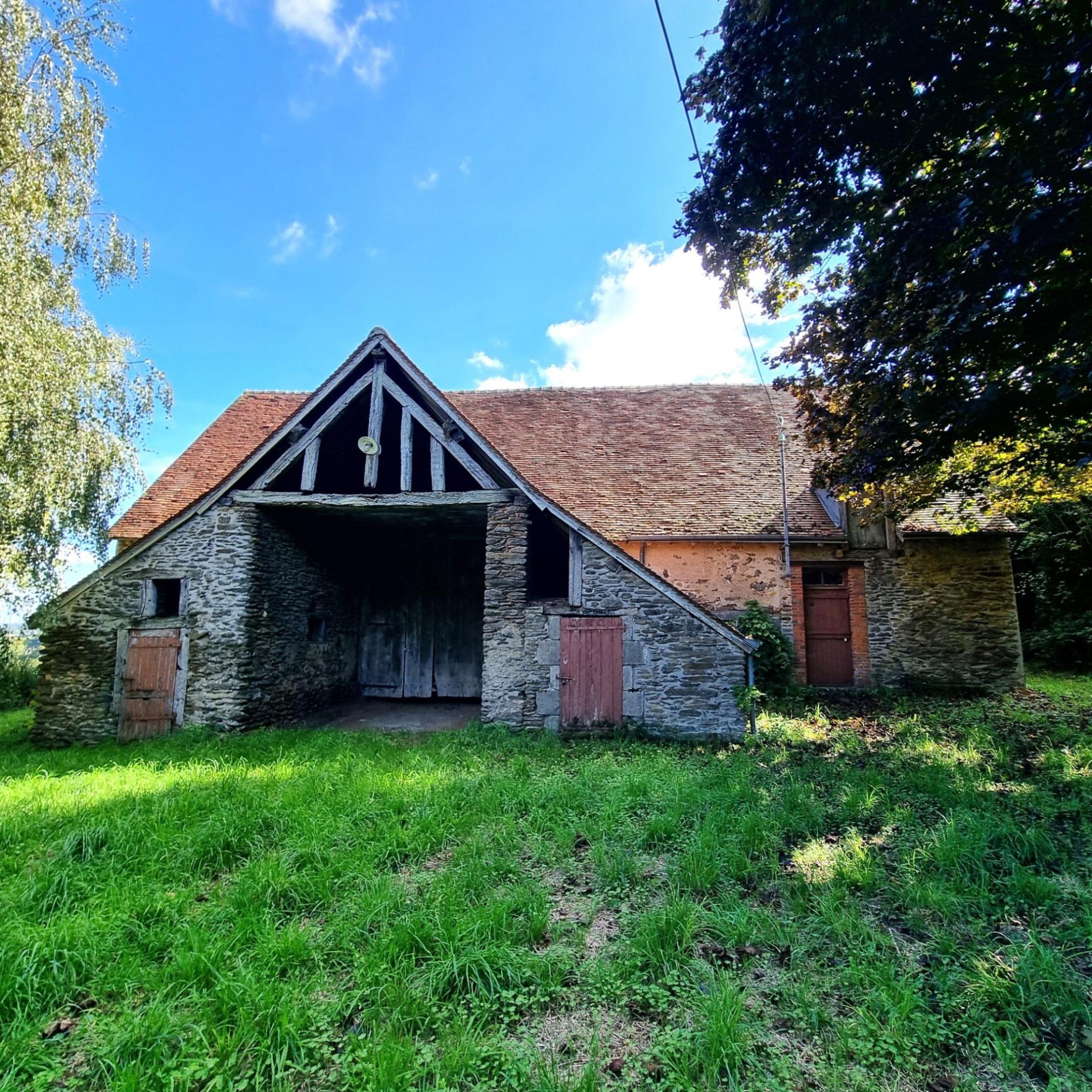 Maison avec grange à porteau !