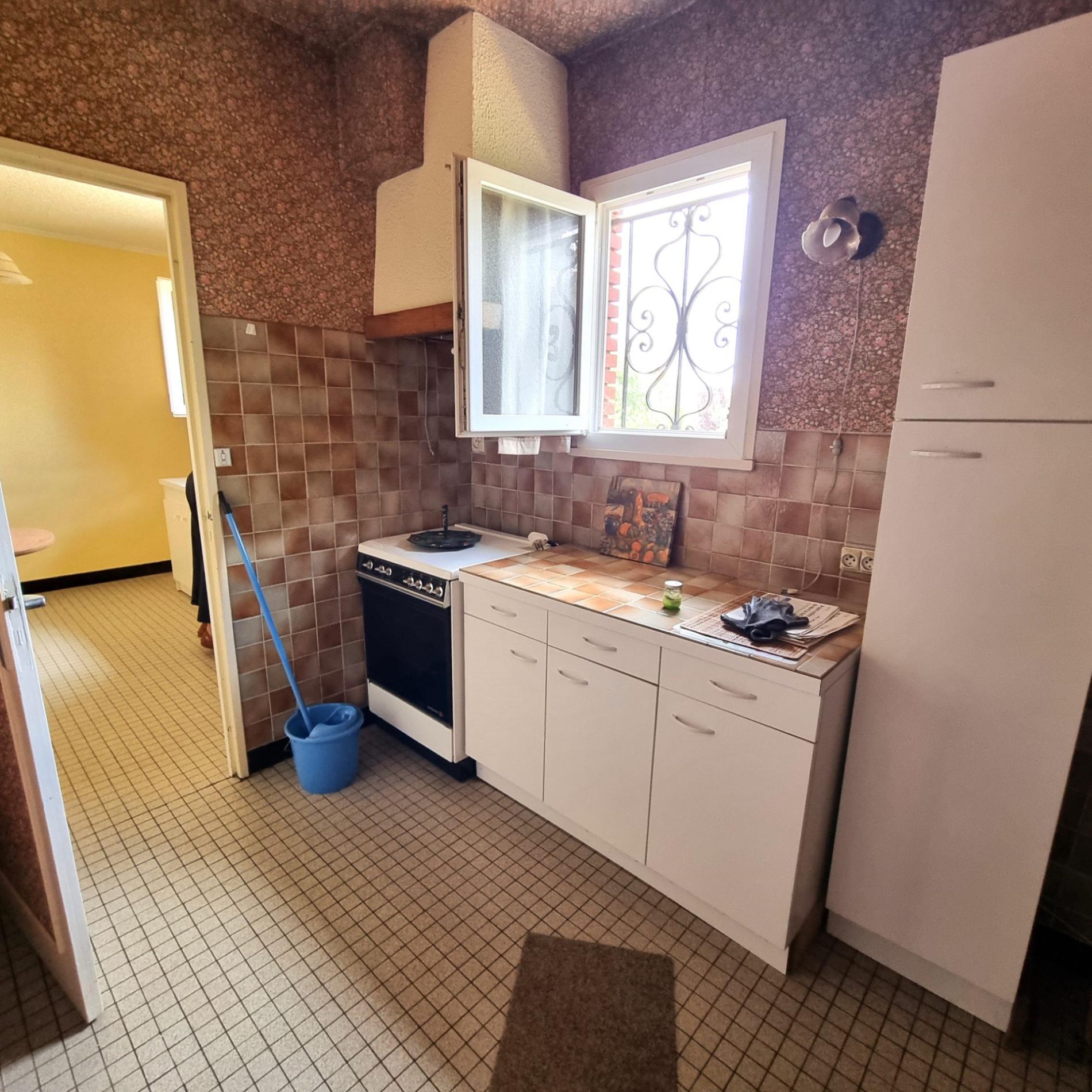 Maison de ville mitoyenne !