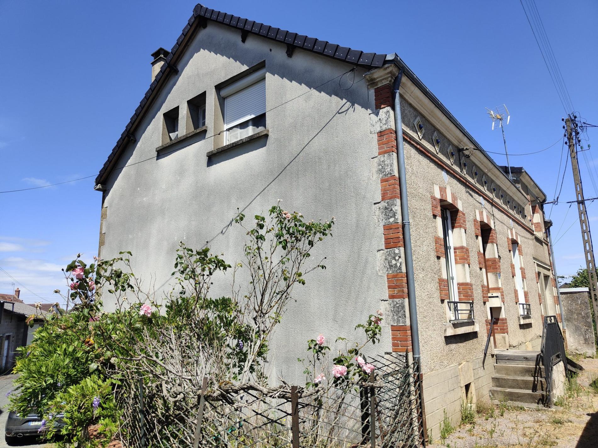 Ensemble de deux maisons de ville avec jardin !