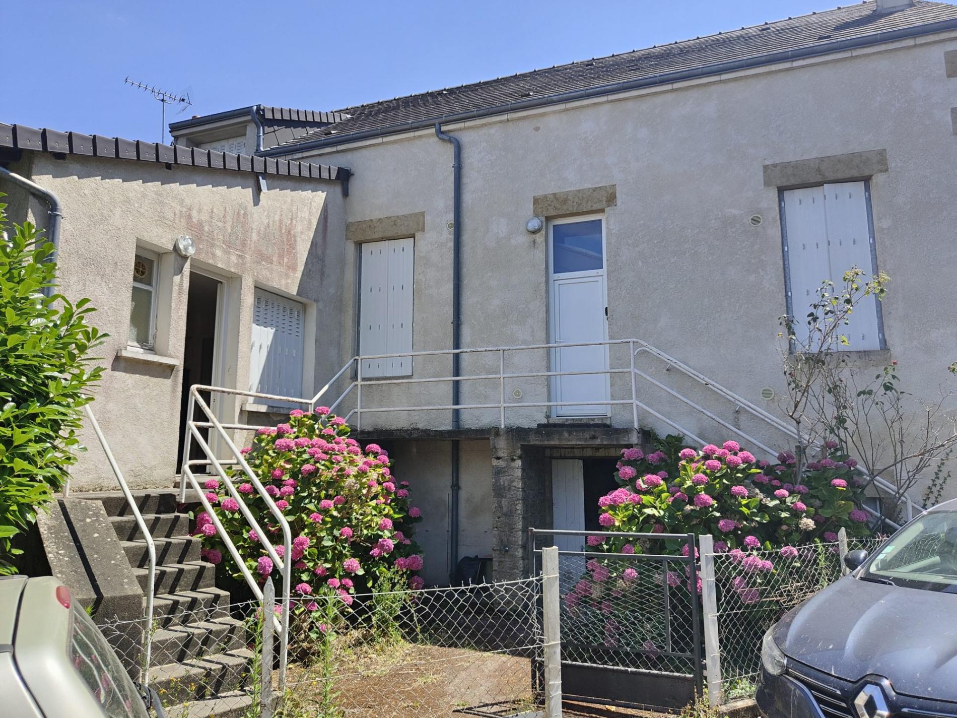 Ensemble de deux maisons de ville avec jardin !