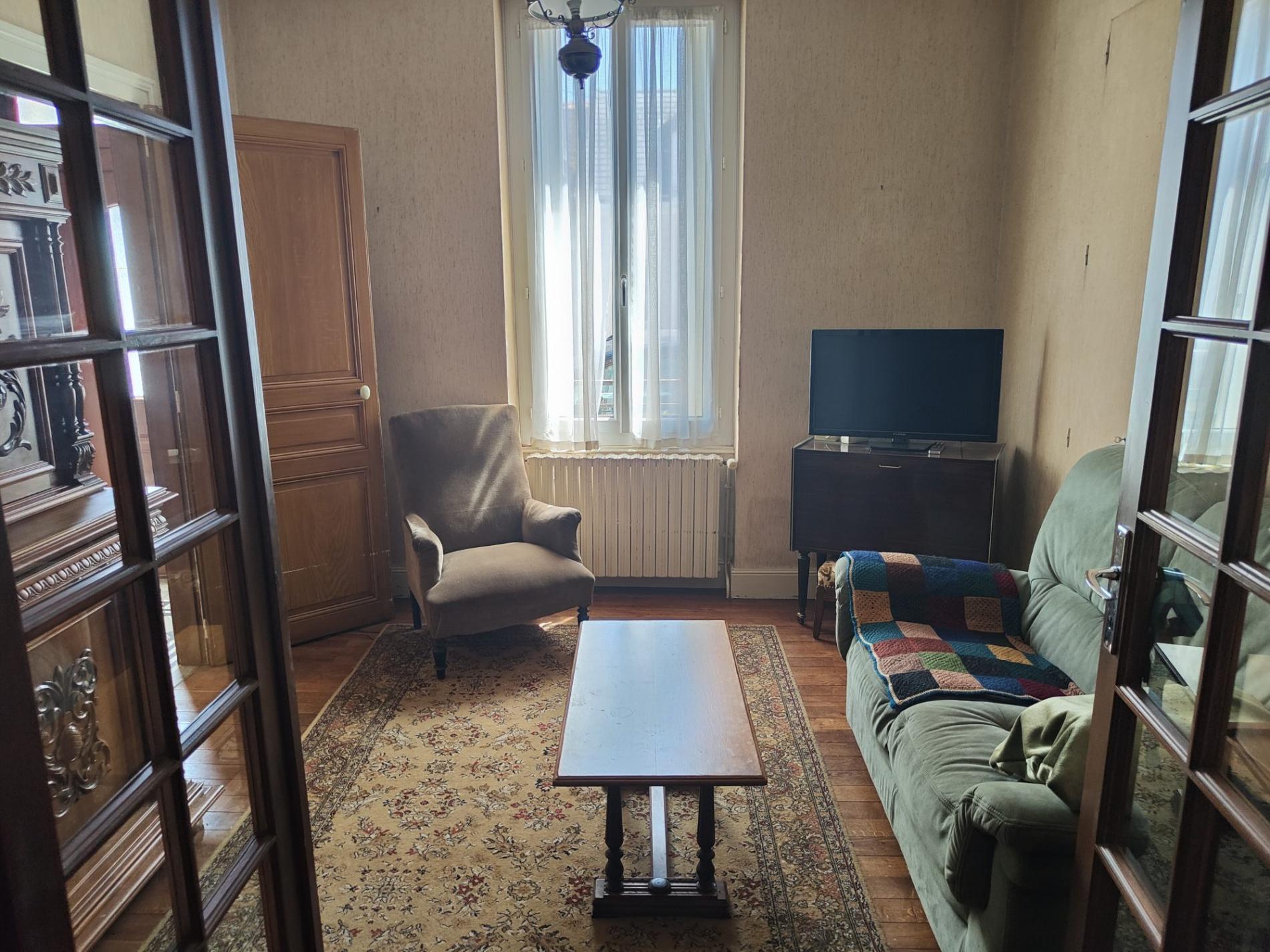 Ensemble de deux maisons de ville avec jardin !