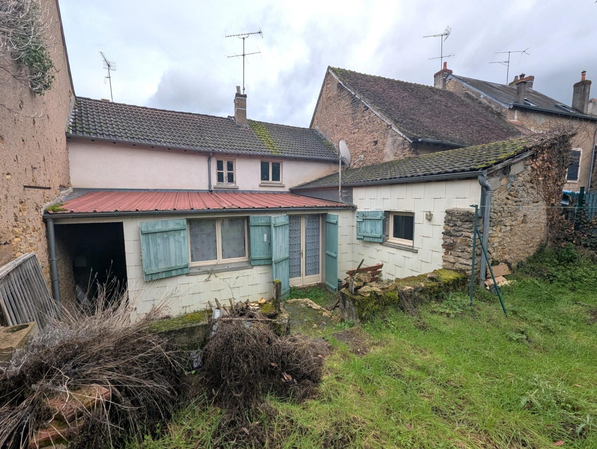 Maison de ville avec jardin et garage !