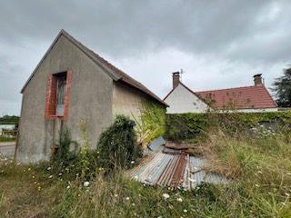 Terrain à bâtir avec dépendance