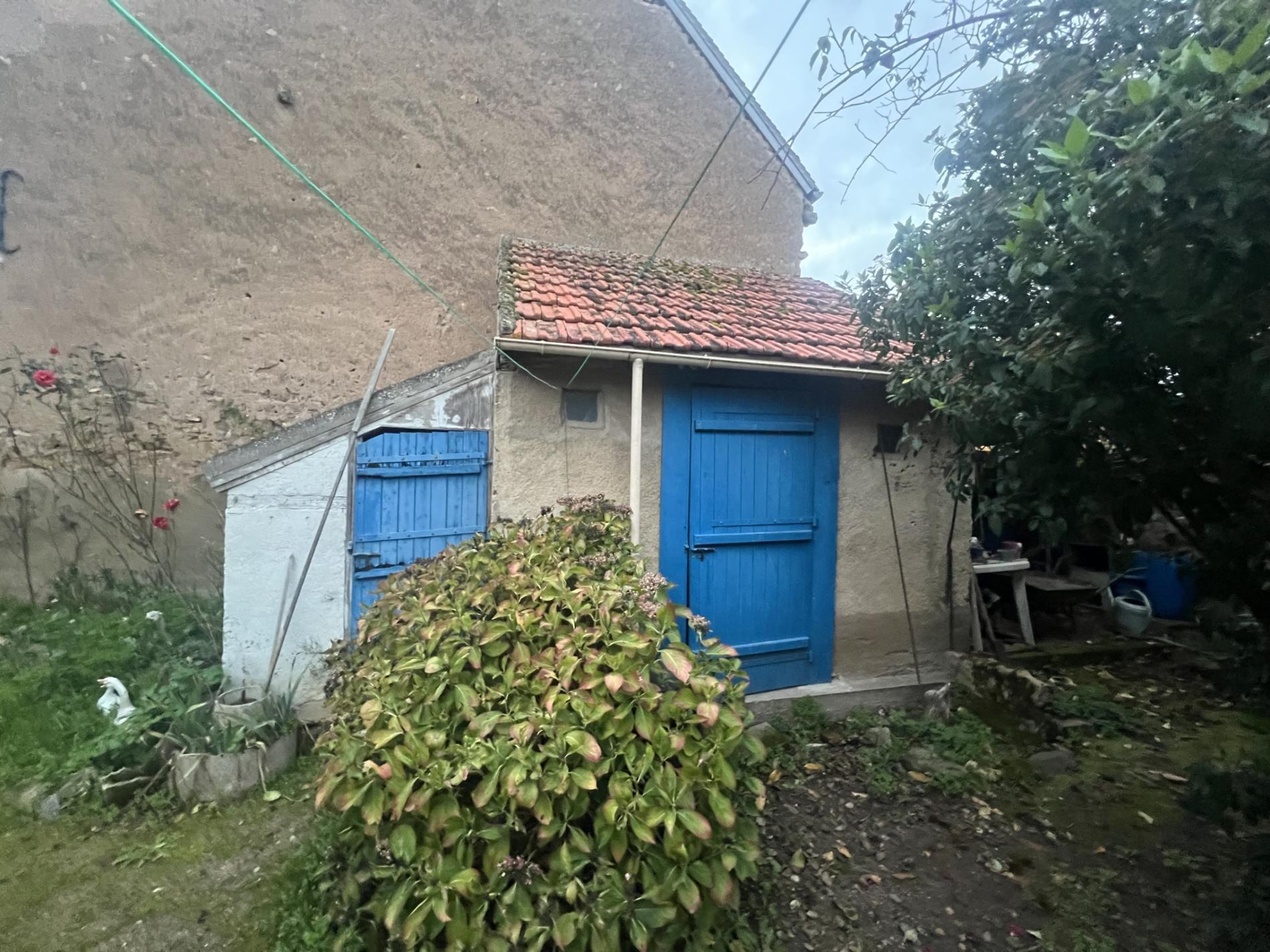 Maison de ville avec dépendances