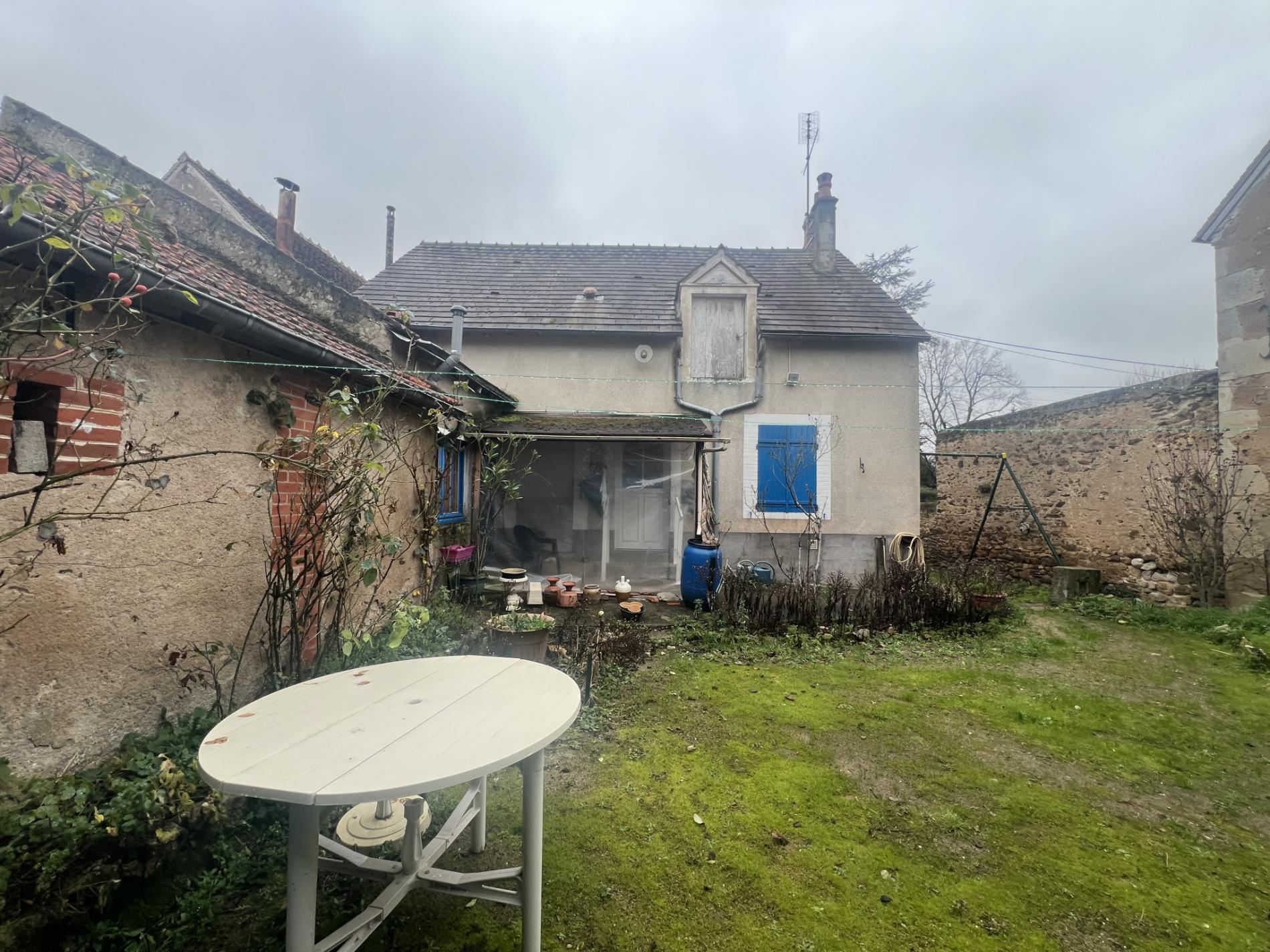 Maison de ville avec dépendances