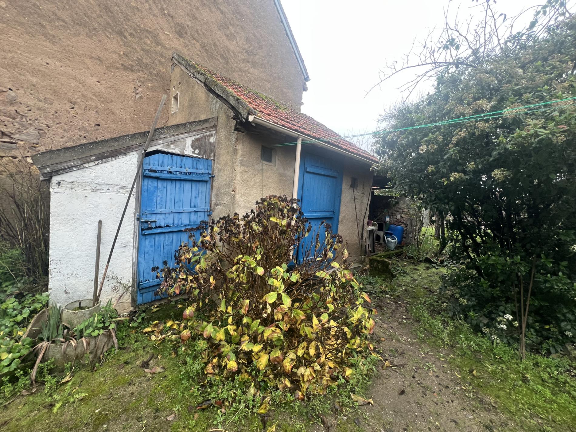 Maison de ville avec dépendances