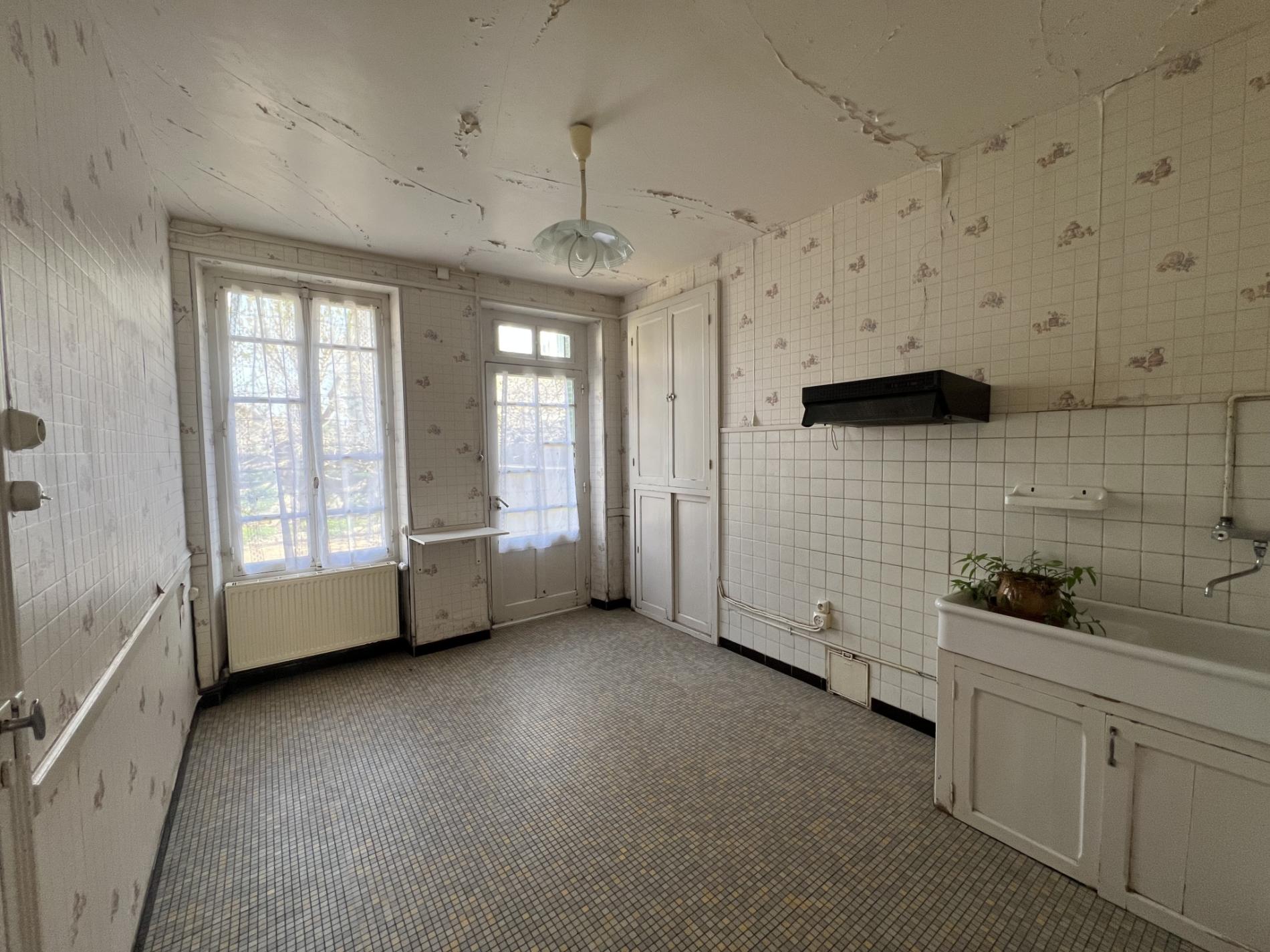 Maison de ville avec jardin et garage !