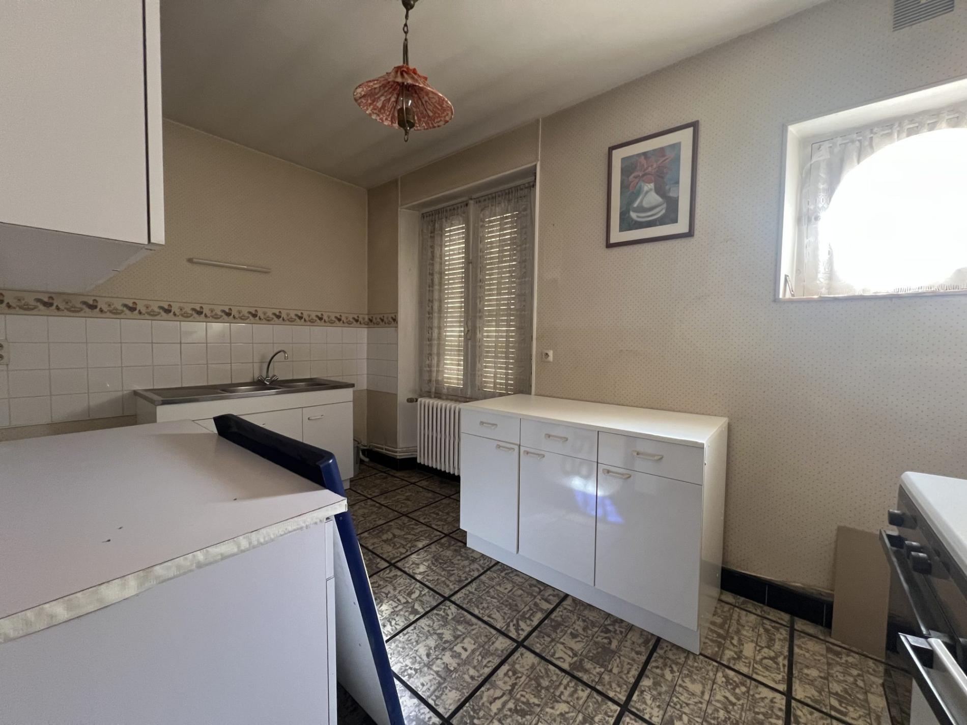 Ensemble Immobilier de deux maisons de ville avec commerce !
